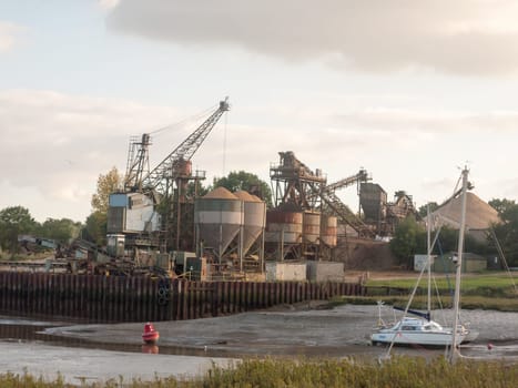 sand industry materials quarry dock factory across river  England  Essex