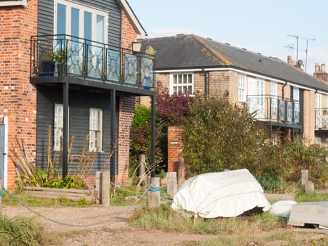 outside of home down at the seafront balcony and covered boat  England  Essex