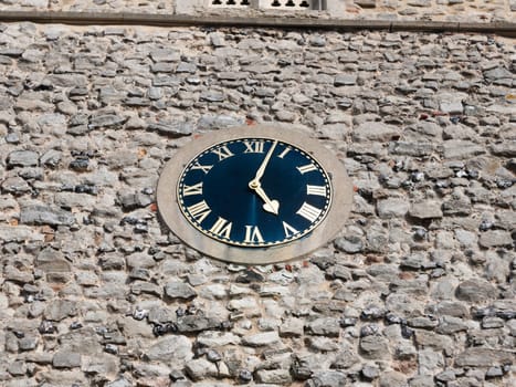 stunning old clock outside on church brick wall   England  Essex