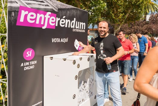 Badajoz, Spain - september 23, 2017:Man participating in symbolic referendum to claim railway improvements in Extremadura