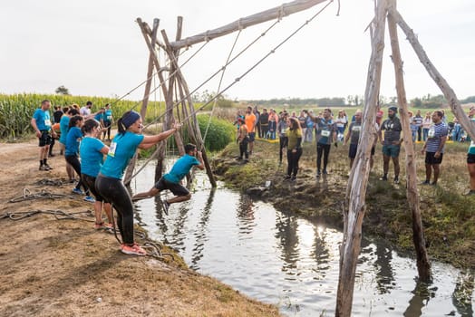 ESTARREJA, PORTUGAL - SEPTEMBER 23: Athletes go through mud and water at the Biorace on september 23, 2017 in Estarreja, Portugal.