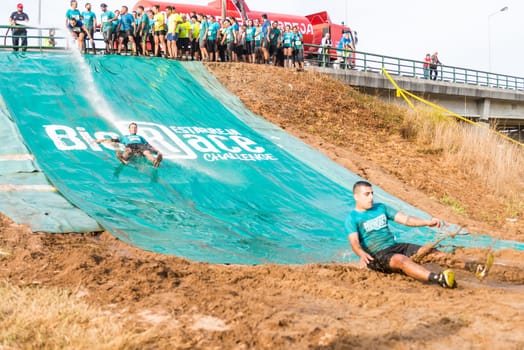 ESTARREJA, PORTUGAL - SEPTEMBER 23: Athletes sliding to mud and water at the Biorace on september 23, 2017 in Estarreja, Portugal.
