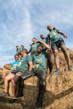 ESTARREJA, PORTUGAL - SEPTEMBER 23: Athletes overcoming the hay osbtacle at the Biorace on september 23, 2017 in Estarreja, Portugal.