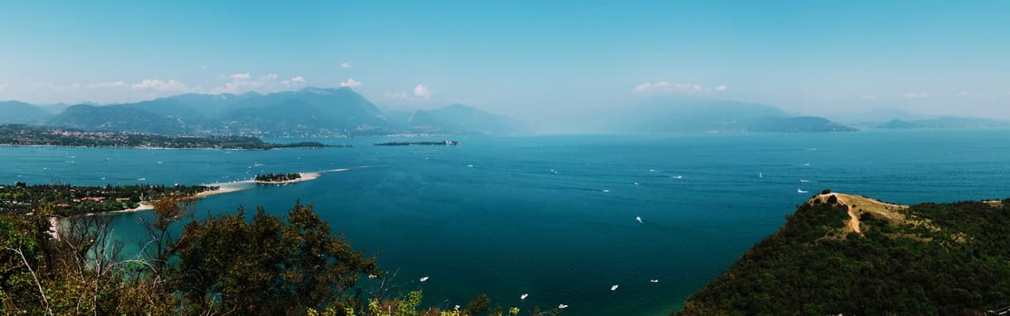 panoramic view of garda lake,italy,low visibility