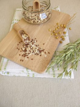Seed mixture in a glass with oatmeal,flaxseed and sesame