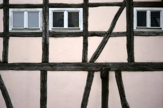 The beam construction and the wooden scaffolding of a half-timbered house.