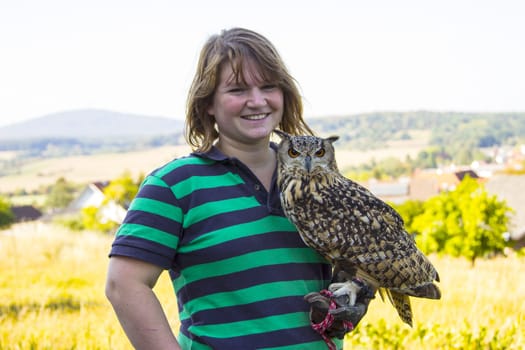 Young female keeps Indian eagle owl female