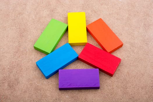 Wooden blocks on a brown background