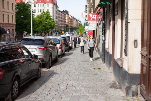 Stockholm, Sweden - June 09, 2017 : Urban life. People Walking In A Big City Street