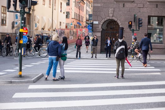 Stockholm, Sweden - June 09, 2017 : Urban life. People Walking In A Big City Street