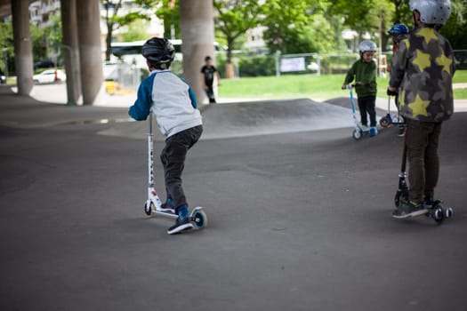 Powerful funny young guys are trained in a skate park Stockholm, Sweden. Leisure, playing, trick