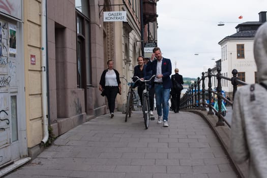 Stockholm, Sweden - June 09, 2017 : Urban life. People Walking In A Big City Street