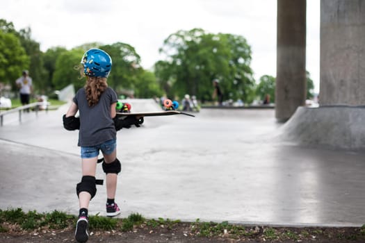 Powerful funny young guys are trained in a skate park Stockholm, Sweden. Leisure, playing, trick