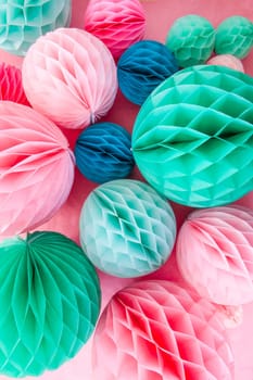 Many colorful honeycomb bases made of tissue paper as party decoration