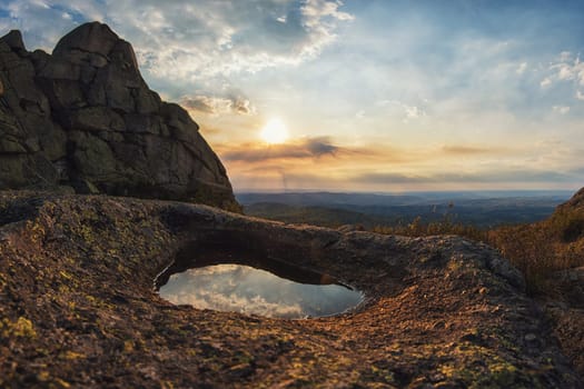 Beautiful sundown on the peak of Sinyukha mountain, Altai, Siberia, Russia