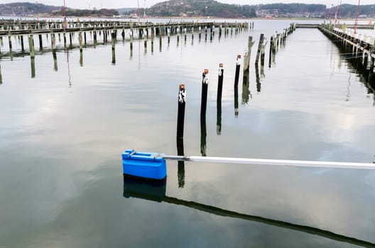a very emty harbour no boats it is winter