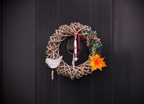 creative door decoration on a dark wooden door