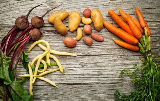 Fresh vegetables on wooden background