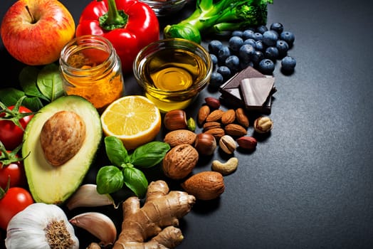 Mixed of fresh healthy food on dark background