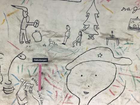 STOCKHOLM, SWEDEN - JUNE 10, 2017: Hallonbergen tunnelbanestation Underground. Station on blue line of the metro with kids paintings, doodles, characters