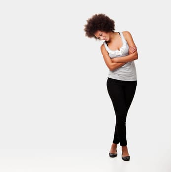 Beautiful african american woman isolated on white background and looking down