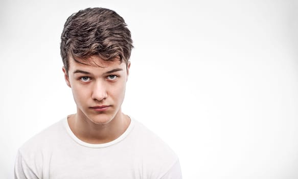 Young handsome man in red blouse looking ahead
