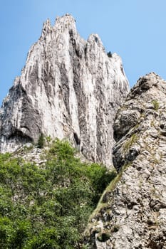 Mountain scenery with rocks and green trees