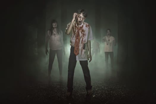 Some spooky asian zombies with blood walking around in the misty forest