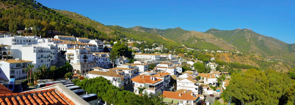 View of little village with green landscape the hill in Mijas, Spain