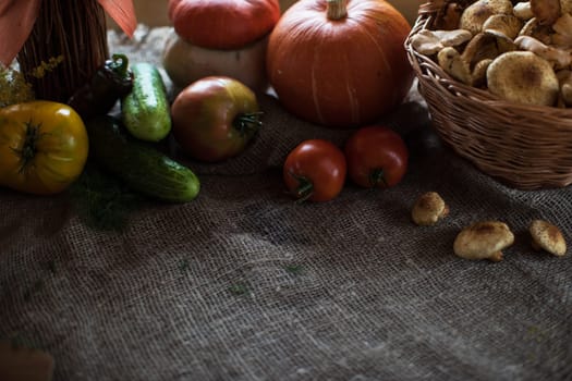 Still life from autumn nature gifts. mushrooms and vegetables