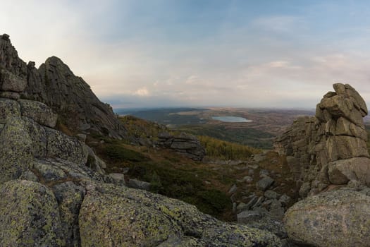 Beauty view on Sinyukha mountain to White lake, the highest mountain of Kolyvan ridge, in the Altai Territory of Russia
