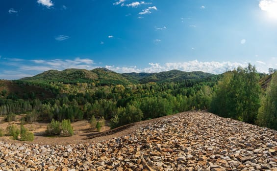 Big mountain from stones, settlement in the Altai Territory. at the foot of Mount Sinyuha, the village was served by a tungsten mine.