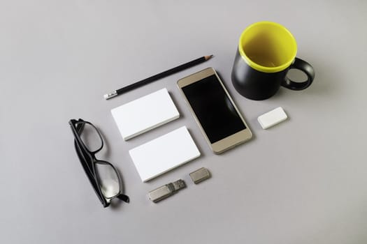 Set of blank stationery elements on gray background. Branding template. Photo of blank stationery. Mock-up for your design.