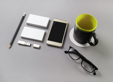 Corporate identity template on gray background. Photo of blank stationery. Mock up for placing your design.