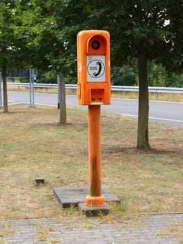 Orange European Highway Emergency Rescue Telephone Post Closeup