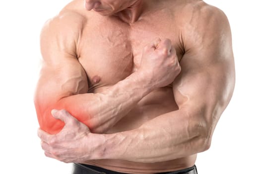 Closeup of shirtless man with elbow pain isolated in white background