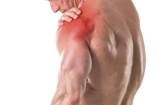 Closeup of shirtless man with shoulder pain isolated in white background
