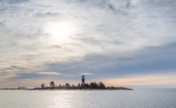 Light House in Holmsund, Sweden with a cloudy sky.