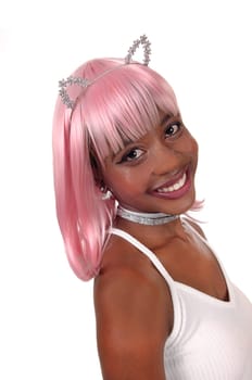 A lovely smiling young African woman with pink hair and silver bunny.ears in a closeup portrait image, isolated for white background.