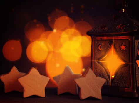 Christmas background with star shapes and candle lights