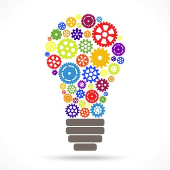 light bulb with colored gear wheels for cooperation,teamwork or development symbolism