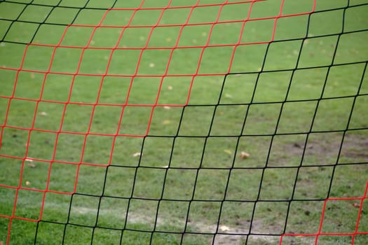The net of a football goal via close-up.