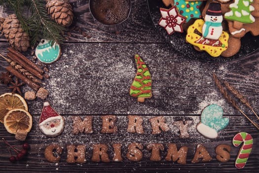 Homemade ginger cookies for new years and christmas on wooden background, xmas theme