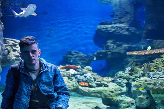 Photo of man with son in the oceanarium