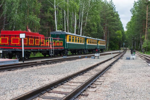 Railway tracks with old trains in beauty day