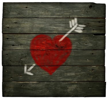 painted heart with arrow on old board wall
