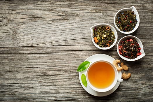 Cup of tea with dry tea collection of different types