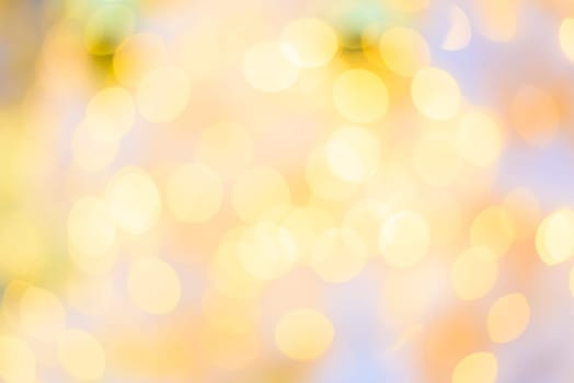 Abstract circular natural orange and yellow light bokeh background