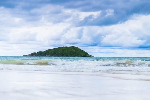 Beautiful tropical beach and sea on blue sky background