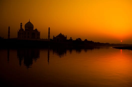 Panoramic view of Taj Mahal at sunset with reflection, Agra, Uttar Pradesh, India.